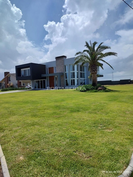 Casa à venda com 04 suítes no condomínio Lagoa do Passo: 1ª foto da galeria de imagens do imóvel