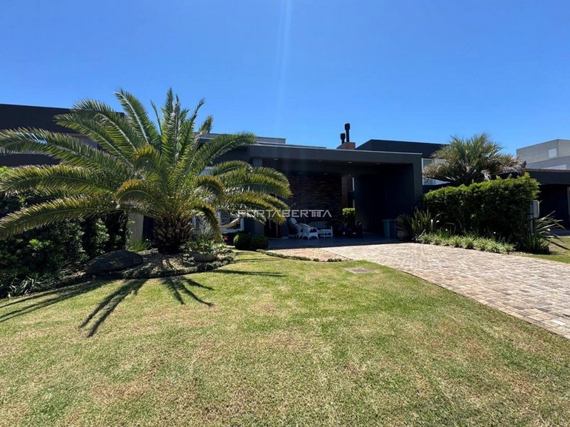 Casa com 04 suítes no condomínio Riviera em Xangri-lá RS: 2ª foto da galeria de imagens do imóvel