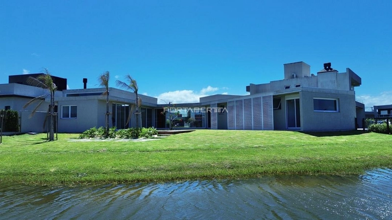 Casa com 04 suítes no condomínio Riviera em Xangri-lá RS: 5ª foto da galeria de imagens do imóvel