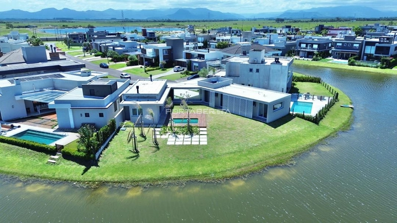 Casa com 04 suítes no condomínio Riviera em Xangri-lá RS: 4ª foto da galeria de imagens do imóvel