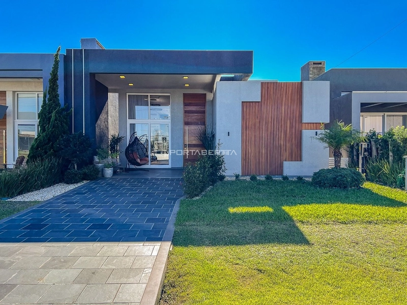 Casa com 04 suítes no condomínio Riviera em Xangri-lá RS: 1ª foto da galeria de imagens do imóvel