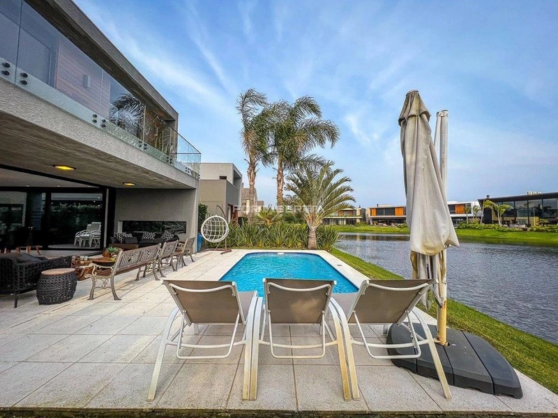 Sobrado beira lago, mobiliado e decorado, condomínio Enseada.: 6ª foto da galeria de imagens do imóvel