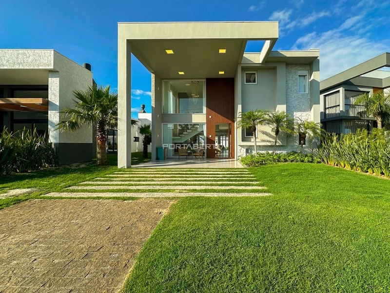Casa com 04 suítes no condomínio Riviera em Xangri-lá RS: 1ª foto da galeria de imagens do imóvel