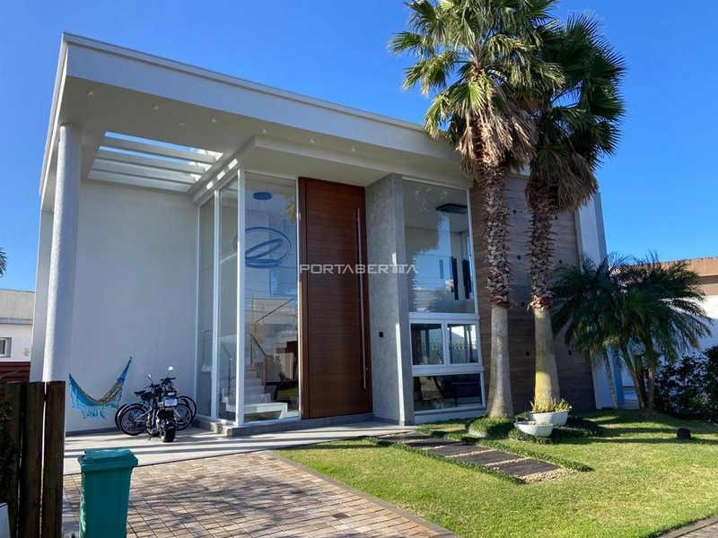 Casa com 04 suítes à venda no condomínio Las Palmas em Xangri-lá RS: 1ª foto da galeria de imagens do imóvel