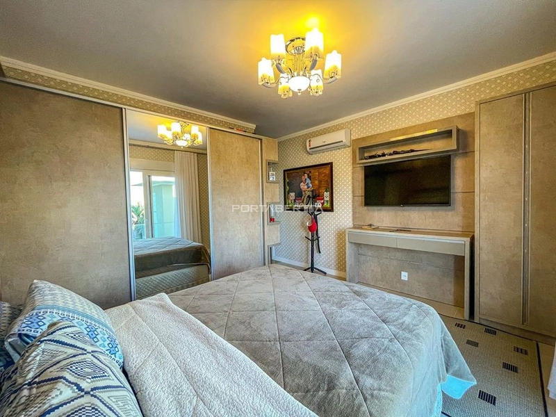 Casa com 04 suítes à venda no condomínio Las Palmas em Xangri-lá RS: 4ª foto da galeria de imagens do imóvel
