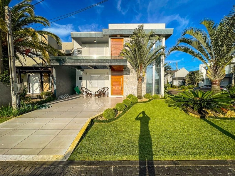 Casa com 04 suítes à venda no condomínio Las Palmas em Xangri-lá RS: 1ª foto da galeria de imagens do imóvel