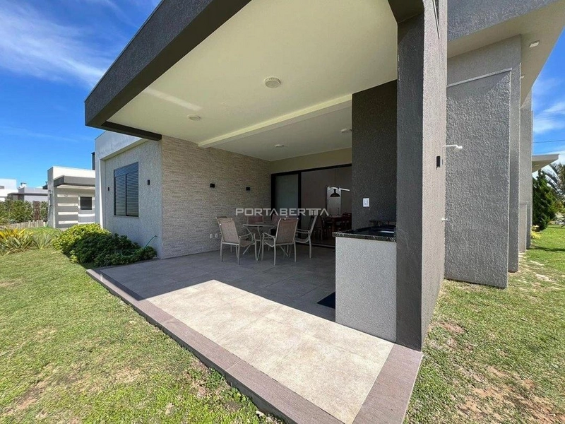 Casa com 04 suítes no condomínio Riviera em Xangri-lá RS: 2ª foto da galeria de imagens do imóvel