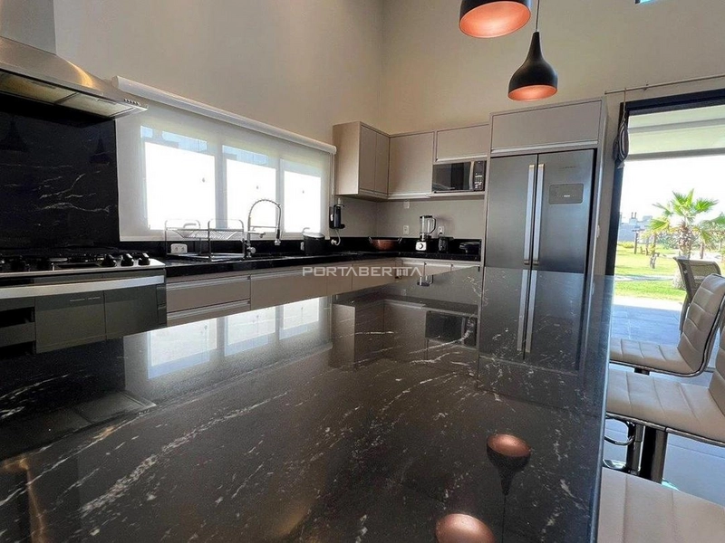 Casa com 04 suítes no condomínio Riviera em Xangri-lá RS: 6ª foto da galeria de imagens do imóvel