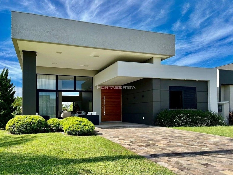 Casa com 04 suítes no condomínio Riviera em Xangri-lá RS: 1ª foto da galeria de imagens do imóvel
