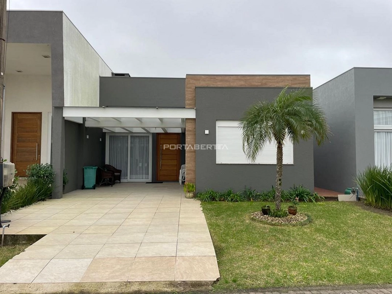 Casa com 03 suítes à venda no condomínio Las Palmas em Xangri-lá RS: 1ª foto da galeria de imagens do imóvel
