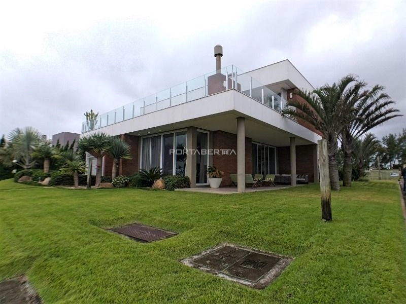 Casa à venda de esquina no condomínio Playa Vista em Xangri-lá RS: 1ª foto da galeria de imagens do imóvel