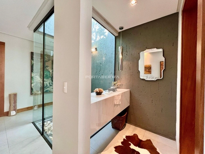 Casa com 04 suítes no condomínio Ventura em Xangri-lá RS: 15ª foto da galeria de imagens do imóvel