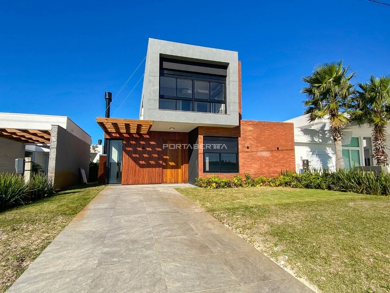 Casa com 04 suítes no condomínio Riviera em Xangri-lá RS: 1ª foto da galeria de imagens do imóvel
