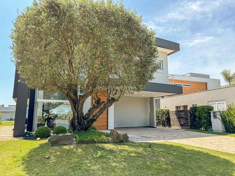 Sobrado beira lago, mobiliado e decorado, condomínio Enseada.: 2ª foto da galeria de imagens do imóvel