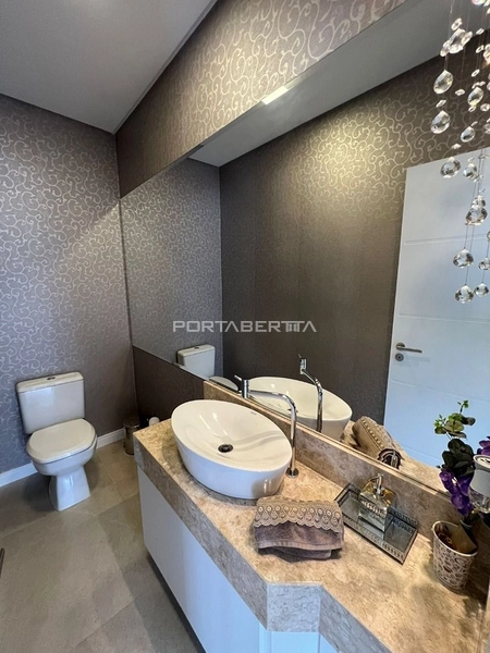 Casa térrea beira lago, mobiliado e decorado, condomínio Enseada.: 11ª foto da galeria de imagens do imóvel
