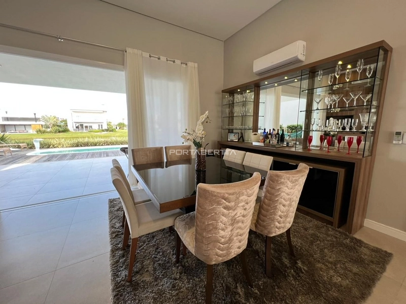 Casa térrea beira lago, mobiliado e decorado, condomínio Enseada.: 25ª foto da galeria de imagens do imóvel