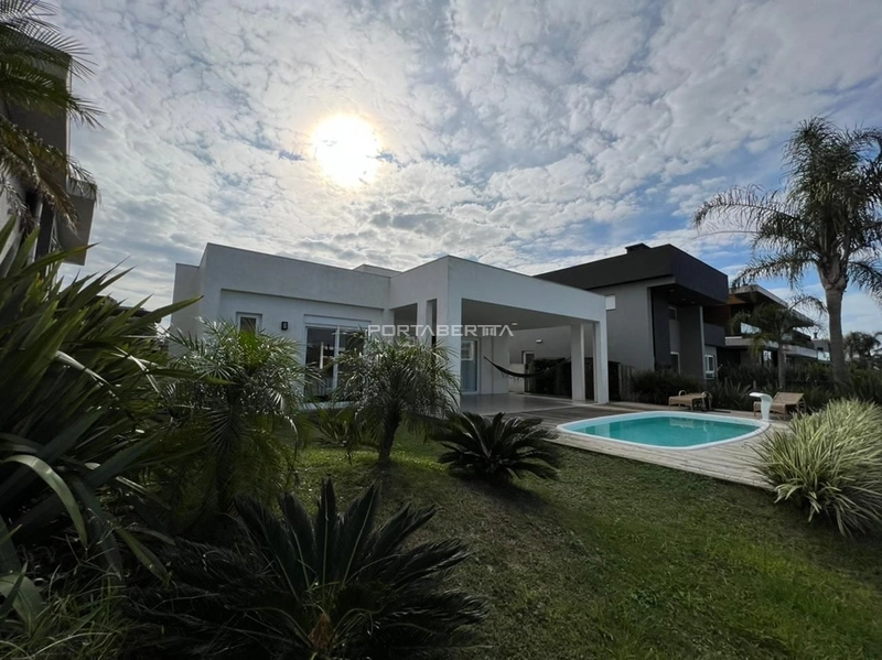 Casa térrea beira lago, mobiliado e decorado, condomínio Enseada.: 20ª foto da galeria de imagens do imóvel