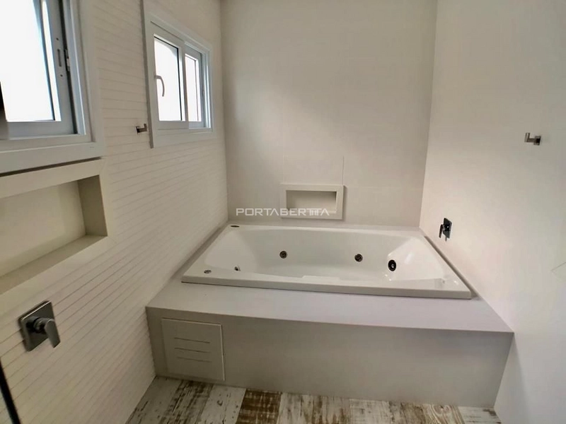Casa à venda com 04 suítes no condomínio La Plage em Xangri-lá RS: 3ª foto da galeria de imagens do imóvel