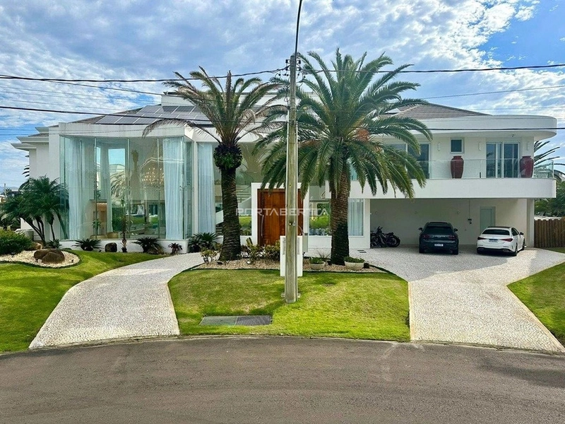 Sobrado beira lago, mobiliado e decorado, condomínio Enseada.: 1ª foto da galeria de imagens do imóvel