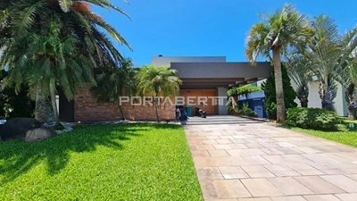 Sobrado beira lago, mobiliado e decorado, condomínio Enseada.: 1ª foto da galeria de imagens do imóvel