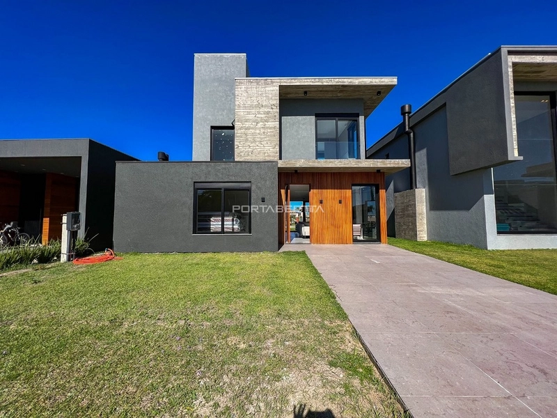 Casa com 04 suítes no condomínio Riviera em Xangri-lá RS: 1ª foto da galeria de imagens do imóvel