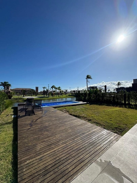 Casa com 04 suítes no condomínio Riviera em Xangri-lá RS: 3ª foto da galeria de imagens do imóvel