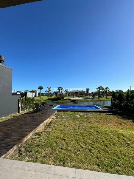Casa com 04 suítes no condomínio Riviera em Xangri-lá RS: 4ª foto da galeria de imagens do imóvel
