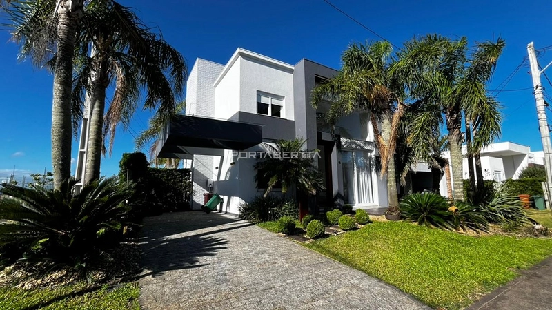 Casa com 04 suítes à venda no condomínio Las Palmas em Xangri-lá RS: 1ª foto da galeria de imagens do imóvel