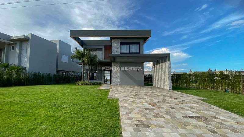 Casa com 05 suítes no condomínio Riviera em Xangri-lá RS: 1ª foto da galeria de imagens do imóvel
