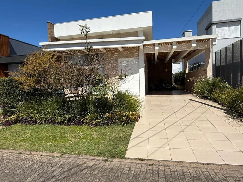 Casa com 03 suítes à venda no condomínio Las Palmas em Xangri-lá RS: 1ª foto da galeria de imagens do imóvel