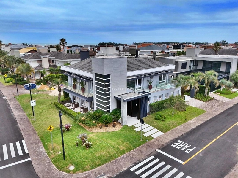 Casa com 05 dormitórios à venda no condomínio Las Dunas em Xangri-lá RS: 1ª foto da galeria de imagens do imóvel