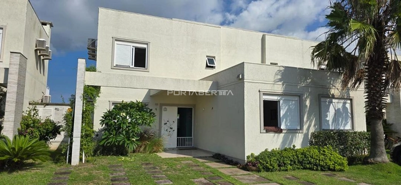 Sobrado com 03 dormitórios no condomínio Páteo Marbella em Xangri-lá RS: 1ª foto da galeria de imagens do imóvel