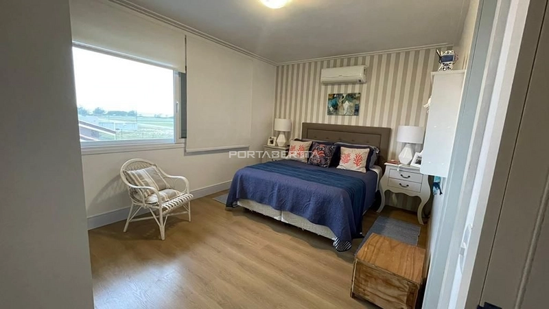 Casa com 04 suítes à venda no condomínio Las Dunas em Xangri-lá RS: 2ª foto da galeria de imagens do imóvel