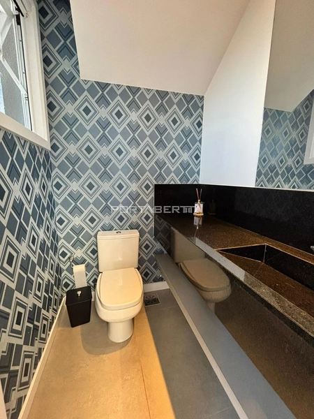 Casa com 04 suítes no condomínio Riviera em Xangri-lá RS: 2ª foto da galeria de imagens do imóvel