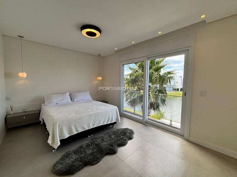 Casa com 04 suítes no condomínio Riviera em Xangri-lá RS: 5ª foto da galeria de imagens do imóvel