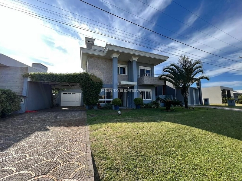 Casa com 05 dormitórios no condomínio Riviera em Xangri-lá RS: 1ª foto da galeria de imagens do imóvel