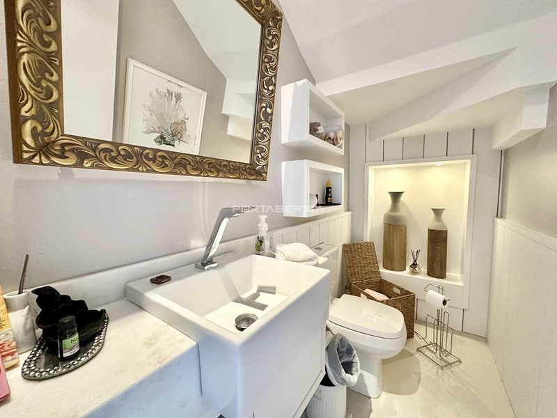 Casa com 04 suítes à venda no condomínio Las Palmas em Xangri-lá RS: 3ª foto da galeria de imagens do imóvel