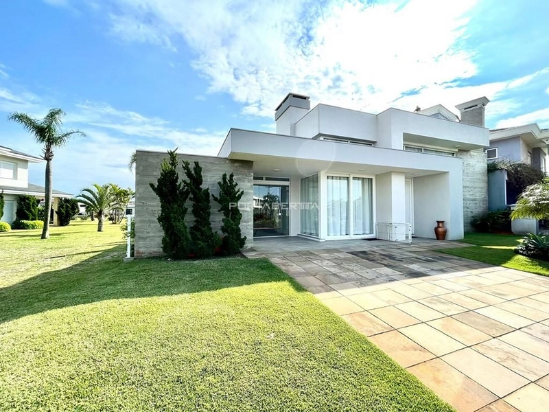 Casa com 04 suítes no condomínio Riviera em Xangri-lá RS: 1ª foto da galeria de imagens do imóvel