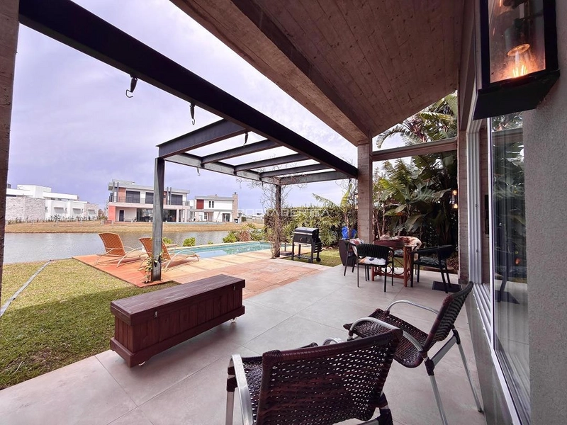Casa com 04 suítes no condomínio Riviera em Xangri-lá RS: 5ª foto da galeria de imagens do imóvel