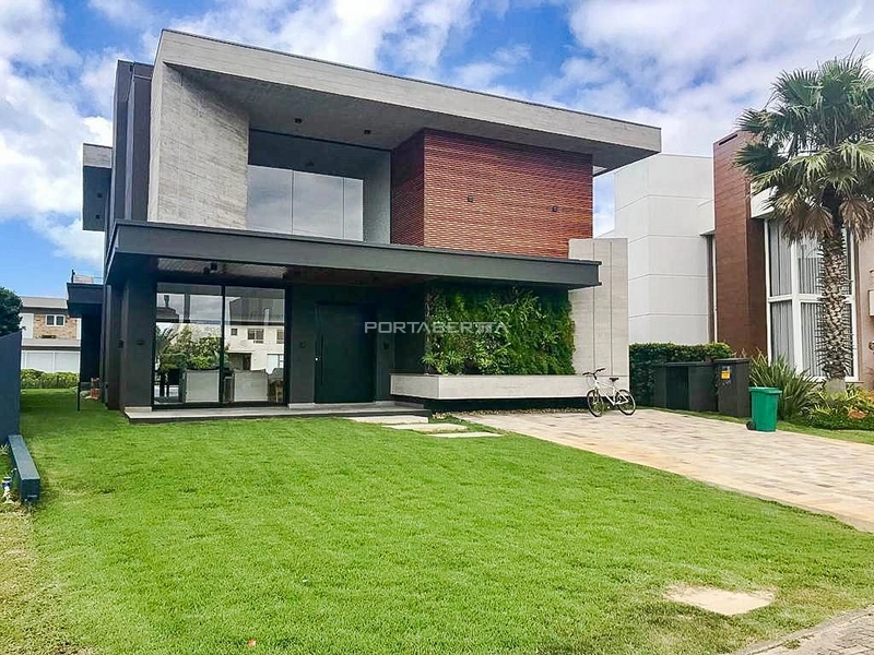 Sobrado com 05 suítes beira lago no condomínio Ventura em Xangri-lá RS: 1ª foto da galeria de imagens do imóvel