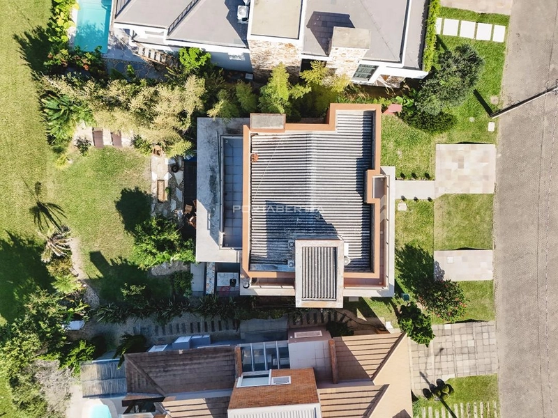 Casa com 04 suítes no condomínio Ventura em Xangri-lá RS: 4ª foto da galeria de imagens do imóvel