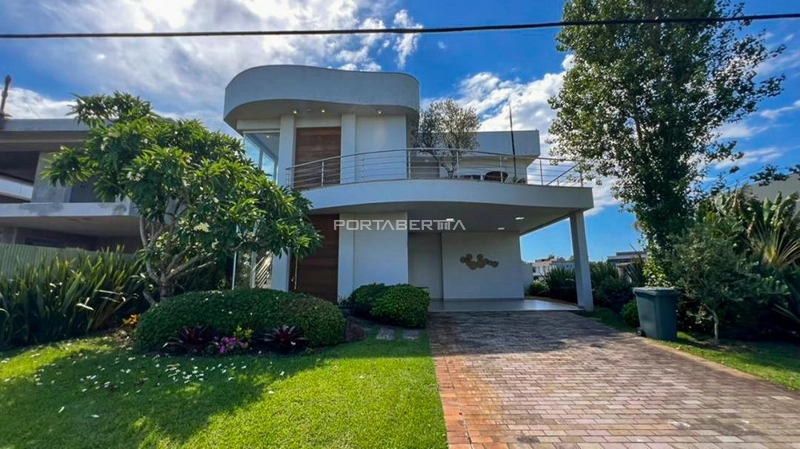 Sobrado beira lago, mobiliado e decorado, condomínio Enseada.: 1ª foto da galeria de imagens do imóvel
