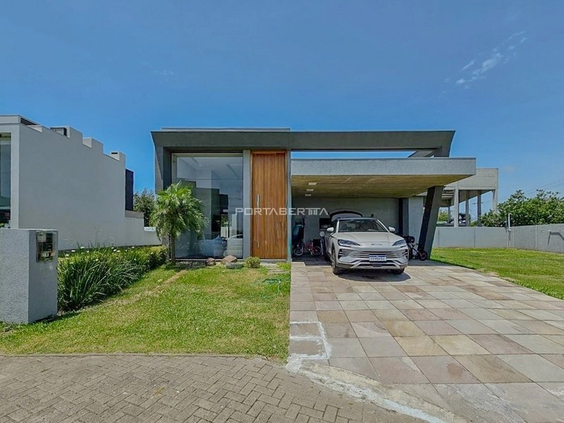 Casa térrea com 04 suítes frente Norte a venda no condomínio Blue em Xangri-lá RS: 1ª foto da galeria de imagens do imóvel