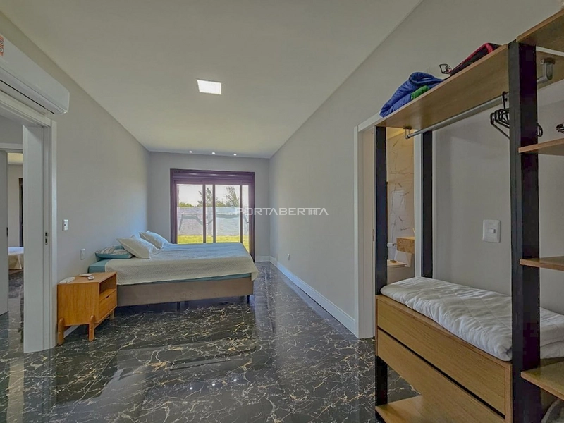 Casa térrea com 04 suítes frente Norte a venda no condomínio Blue em Xangri-lá RS: 4ª foto da galeria de imagens do imóvel