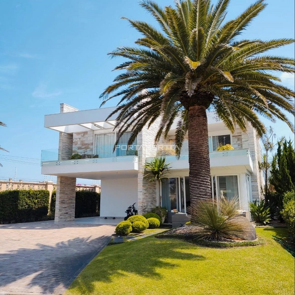 Casa à venda com 05 suítes no condomínio Playa Vista em Xangri-lá RS: 1ª foto da galeria de imagens do imóvel