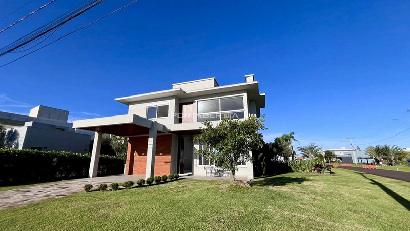 Casa com 04 suítes no condomínio Riviera em Xangri-lá RS: 1ª foto da galeria de imagens do imóvel