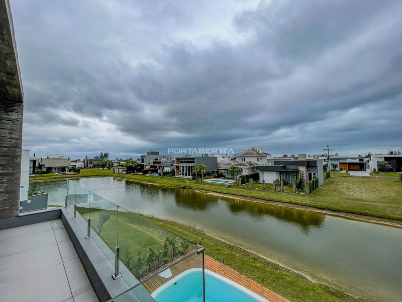 Casa com 04 suítes no condomínio Riviera em Xangri-lá RS: 5ª foto da galeria de imagens do imóvel