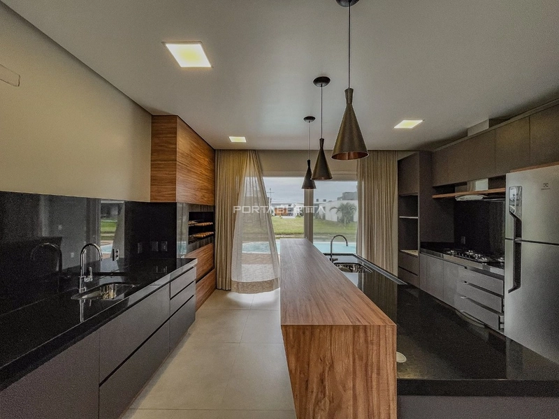 Casa com 04 suítes no condomínio Riviera em Xangri-lá RS: 24ª foto da galeria de imagens do imóvel