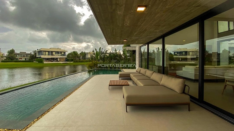 Sobrado beira lago, mobiliado e decorado, condomínio Enseada.: 30ª foto da galeria de imagens do imóvel