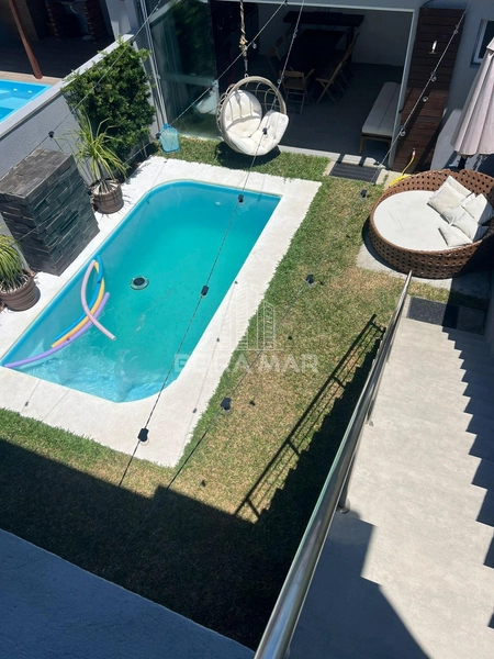 Casa 4 dormitórios a 3 quadras do mar: 4ª foto da galeria de imagens do imóvel